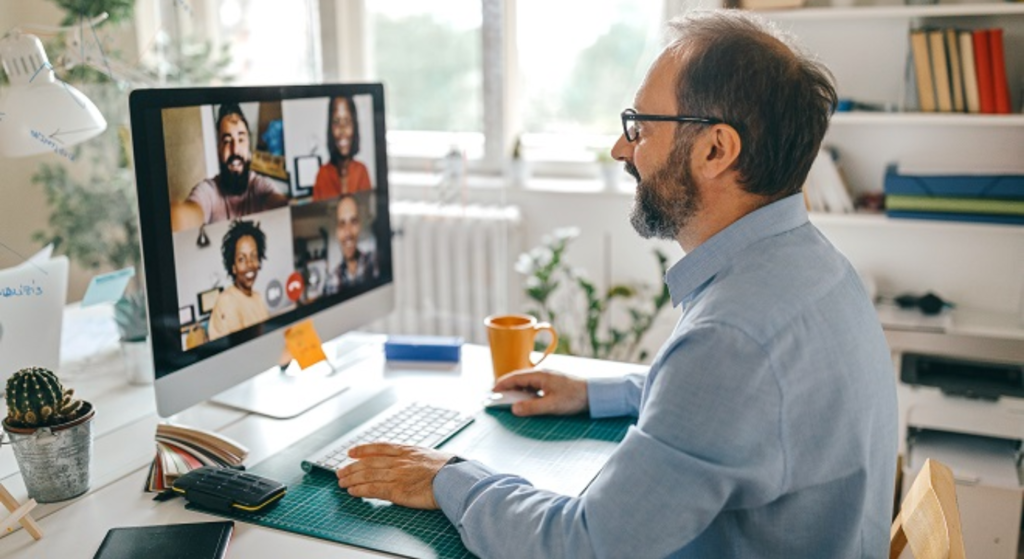 Remote employee having a meeting with his remote team